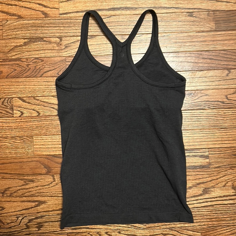 Lululemon EBB to street tank top worn once in great condition Size 12 Womens